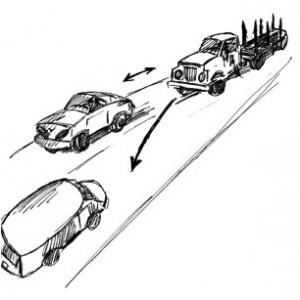 LOG TRUCK HITS PASSENGER MINI-VAN